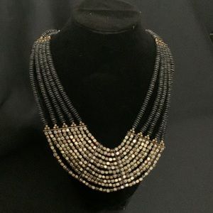 Gold and silver metallic and black bead statement necklace